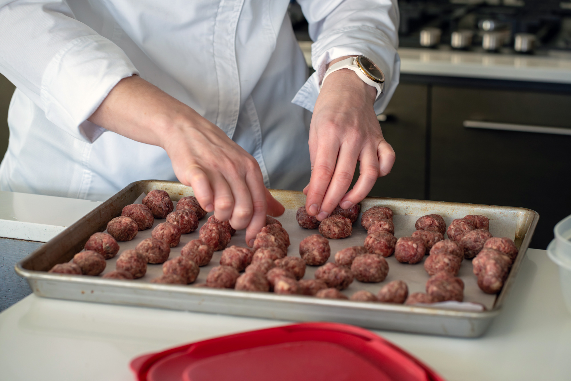 Bison meatball on a baking sheet
