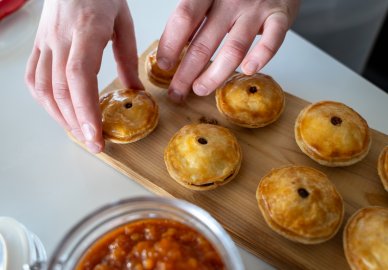 Mini tourtieres on a cutting board