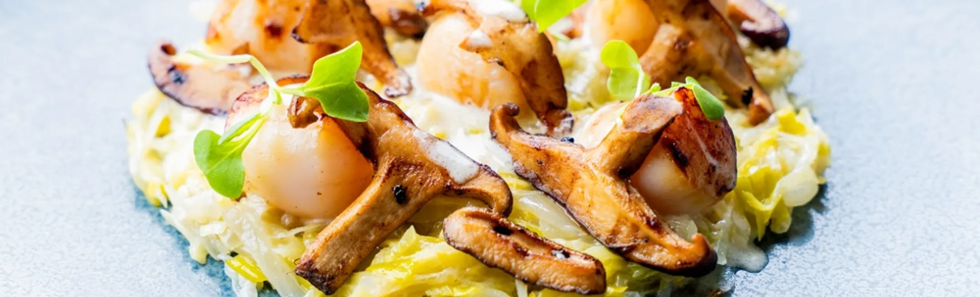 Seared Scallops, Leek Fondue, Shiitake Mushrooms, and Bacon Cream
